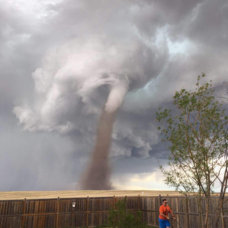 Dad Defies Tornado and Mows His Lawn Mid-Storm